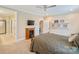 Main bedroom with fireplace, TV mount and ensuite bathroom at 494 Bowline Dr, Denver, NC 28037