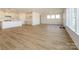 Spacious open floor plan living room area with multiple windows for ample natural light at 3228 Gavin Ln, Harrisburg, NC 28075