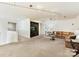 Large bonus room with custom built-in cabinet and a comfortable seating area at 435 S Tryon St # 301, Charlotte, NC 28202