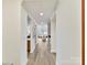 Inviting hallway with hardwood floors and access to living spaces at 435 S Tryon St # 301, Charlotte, NC 28202