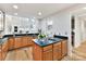 Bright kitchen with hardwood floors and a large window offering plenty of natural light at 435 S Tryon St # 301, Charlotte, NC 28202