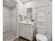 Clean bathroom featuring a vanity with storage, a mirror, and modern fixtures at 5008 Winding Jordan Ln, Charlotte, NC 28269