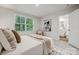 Cozy bedroom featuring a neutral color scheme and an en-suite bathroom at 5008 Winding Jordan Ln, Charlotte, NC 28269