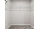Walk-in closet offering plenty of storage space and a neutral color palette at 5008 Winding Jordan Ln, Charlotte, NC 28269
