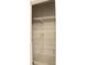 Empty closet featuring four rows of white metal racks and shelves at 525 12Th Sw St # 26, Hickory, NC 28602