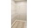 This walk-in closet maximizes storage space with shelving and modern flooring at 525 12Th Sw St # 26, Hickory, NC 28602