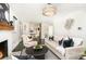 Stylish living room featuring modern decor, a fireplace, and an open layout perfect for entertaining at 630 S Myrtle School Rd, Gastonia, NC 28052