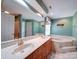 Bathroom with a double sink vanity and a soaking tub at 907 Weymouth Dr, Gastonia, NC 28056