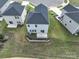 Aerial view of the home showcasing the backyard, patio, and landscaping at 1007 Freeman View Dr, Albemarle, NC 28001