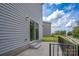 Backyard patio with sliding glass door access to the home at 1007 Freeman View Dr, Albemarle, NC 28001