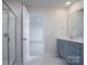 Bathroom view featuring a glass shower and a vanity with quartz countertops at 1007 Freeman View Dr, Albemarle, NC 28001