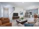 Open-concept living room with modern furniture, seamlessly connected to a stylish kitchen at 1007 Freeman View Dr, Albemarle, NC 28001