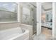 Spa-like bathroom with soaking tub and separate shower at 3150 Helmsley Ct, Concord, NC 28027