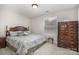 Bedroom with a king-size bed, dresser, and nightstand at 3150 Helmsley Ct, Concord, NC 28027