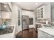 Modern kitchen with gas range and island at 3150 Helmsley Ct, Concord, NC 28027