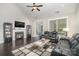 Living room features a fireplace and dark hardwood floors at 3150 Helmsley Ct, Concord, NC 28027