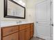 Bathroom with wood vanity and large mirror at 4800 Pimlico Ln, Waxhaw, NC 28173