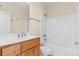 Clean bathroom with tub and wood vanity at 4800 Pimlico Ln, Waxhaw, NC 28173