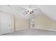 Bright bedroom with ceiling fan and access to hallway at 4800 Pimlico Ln, Waxhaw, NC 28173