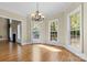 Bright breakfast room with hardwood floors and access to the backyard at 4800 Pimlico Ln, Waxhaw, NC 28173