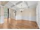 Formal dining room featuring hardwood floors and tray ceiling at 4800 Pimlico Ln, Waxhaw, NC 28173