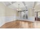 Formal dining room with hardwood floors and wainscoting at 4800 Pimlico Ln, Waxhaw, NC 28173