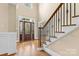 Two-story foyer with hardwood floors and elegant staircase at 4800 Pimlico Ln, Waxhaw, NC 28173