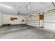 Two-car garage with automatic door opener and storage cabinets at 4800 Pimlico Ln, Waxhaw, NC 28173