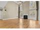 Two-story great room with hardwood floors and fireplace at 4800 Pimlico Ln, Waxhaw, NC 28173