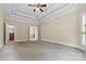 Spacious main bedroom with carpet, ceiling fan and ensuite bathroom at 4800 Pimlico Ln, Waxhaw, NC 28173