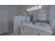 Elegant bathroom featuring double vanity sinks and a large mirror at 10604 Russet Pl, Charlotte, NC 28227