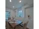 Bright dining room area with hardwood floors and lots of natural light at 10604 Russet Pl, Charlotte, NC 28227