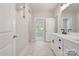 Elegant bathroom featuring a marble countertop, double vanity, and tiled walk-in shower at 8605 Carly Ln, Mint Hill, NC 28227