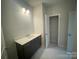 Stylish bathroom vanity offers ample storage and a clean design at 8605 Carly Ln, Mint Hill, NC 28227
