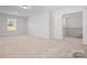 Bright, carpeted bedroom with ample natural light and neutral paint at 8605 Carly Ln, Mint Hill, NC 28227
