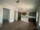 This kitchen has modern lighting fixtures, updated cabinets, and stainless steel appliances at 8605 Carly Ln, Mint Hill, NC 28227