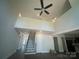Open concept living room with high ceilings and a ceiling fan at 8605 Carly Ln, Mint Hill, NC 28227