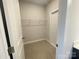 This walk-in closet features carpeted flooring and a wire shelving system at 9411 Stonebridge Way # 49, Mint Hill, NC 28227