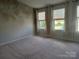 Bright bedroom with wall accent and carpet at 13969 Clayborn St, Midland, NC 28107