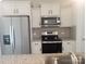 Kitchen with stainless steel appliances and granite countertops at 13969 Clayborn St, Midland, NC 28107