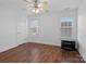 Spacious bedroom with ceiling fan and neutral walls at 16518 Ambassador Park Dr, Huntersville, NC 28078