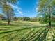 Spacious grassy area perfect for relaxation and recreation at 11612 Kingsley View Dr, Charlotte, NC 28277