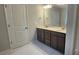 Bathroom with double vanity, undermount sinks, and white marble-look tile flooring at 169 Ella Claire Dr, York, SC 29745