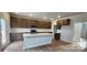 Spacious kitchen boasts stainless steel appliances, a large island, and ample cabinet space at 169 Ella Claire Dr, York, SC 29745