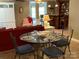 Cozy dining area with a glass-top table, comfortable seating and a built in bar at 24756 Strand Dr, Albemarle, NC 28001