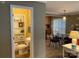 Functional powder room with neutral decor, a toilet, sink, and shelving for towels at 24756 Strand Dr, Albemarle, NC 28001