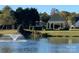 Community park featuring a pond, gazebo, fountains, and a play area at 4016 Holly Villa Cir, Indian Trail, NC 28079