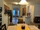 Kitchen with stainless steel appliances and an open view into the dining area at 4016 Holly Villa Cir, Indian Trail, NC 28079