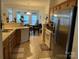 Well-lit kitchen with stainless steel appliances and an open concept to the dining area at 4016 Holly Villa Cir, Indian Trail, NC 28079