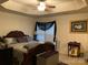 Spacious main bedroom featuring a ceiling fan, window and ample closet space at 4016 Holly Villa Cir, Indian Trail, NC 28079